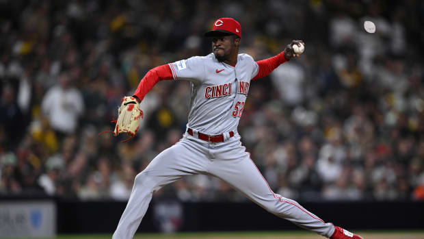 May 1, 2023; San Diego, California, USA; Cincinnati Reds relief pitcher Reiver Sanmartin (52) throws a pitch against the San Diego Padres during the eighth inning at Petco Park. Mandatory Credit: Orlando Ramirez-USA TODAY Sports  